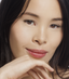 Korean woman with smaller eyes wearing natural-looking fake lashes