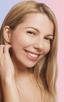 Woman with monolid eyes applying at-home DIY eyelash extensions