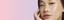 Woman with monolid eyes applying at-home DIY eyelash extensions